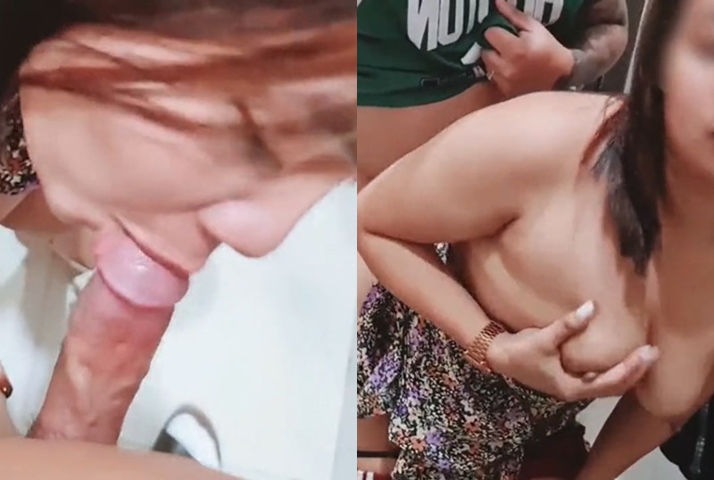 A curvy and busty Thai female employee secretly filmed while adjusting her clothes.